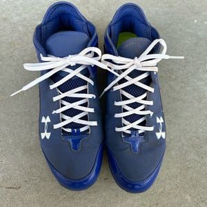 Royal blue Under Armour mid-top metal cleats. Men’s size 12.